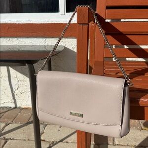 Kate Spade versatile crossbody or top handle chain option. Color is blush .